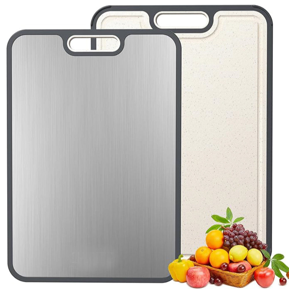 Two cutting boards, one metallic and one textured, with a basket of fruits on a white background.